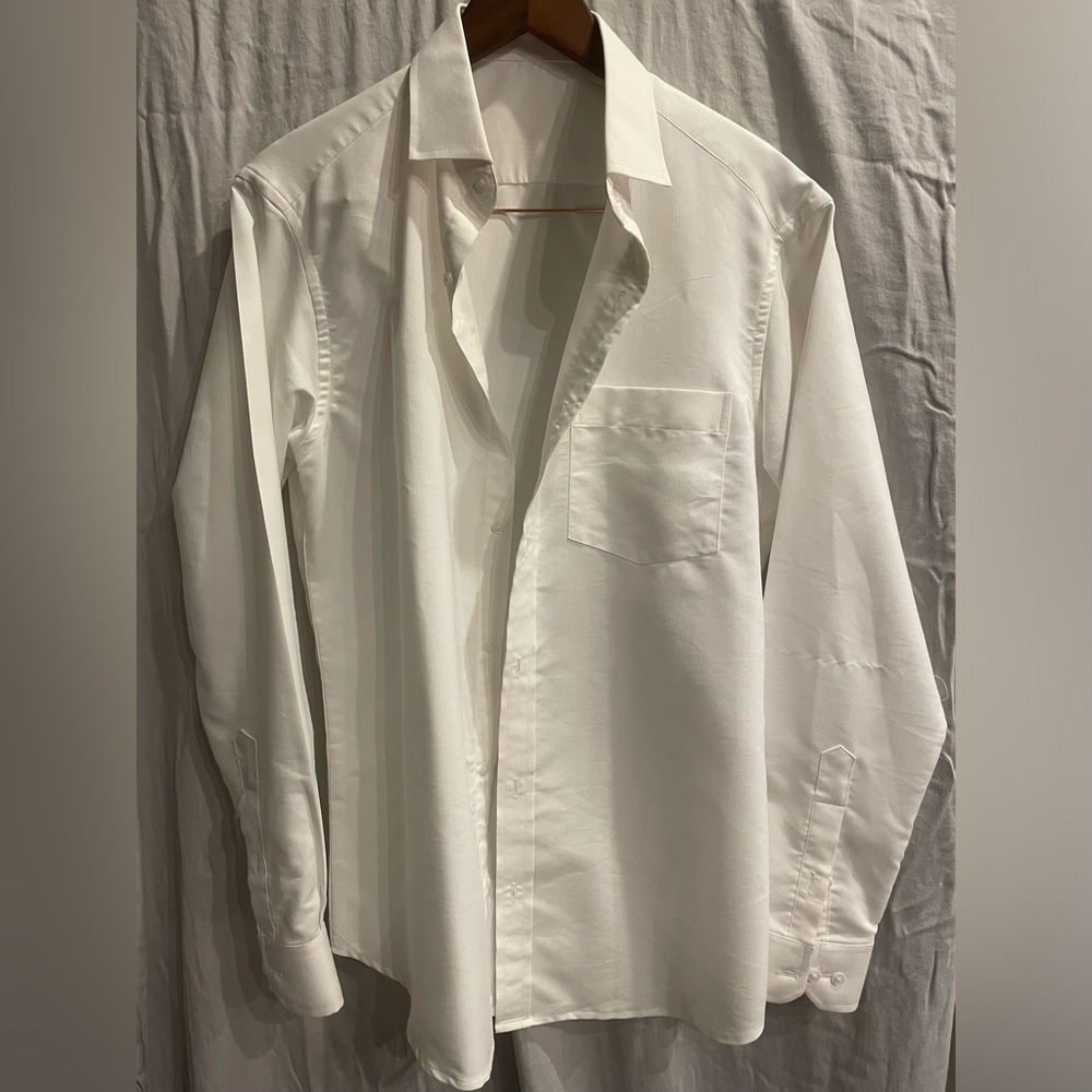 Men’s custom made white dress shirt. Fits like a men’s large. Worn once